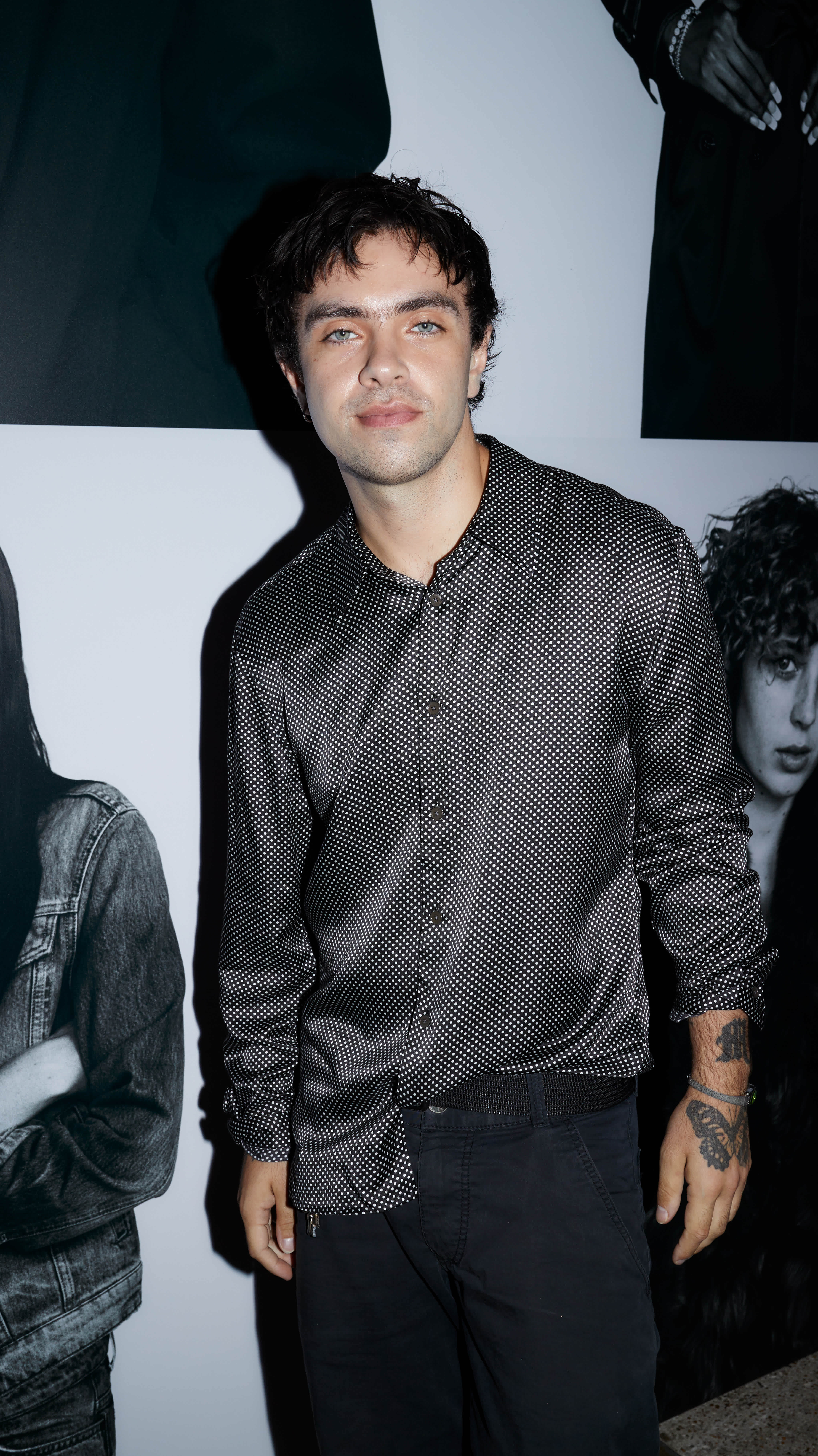 Guest wearing a textured black shirt at the AllSaints Autumn Winter 26 Launch Party.