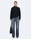 Asymmetric funnel-neck wool jumper