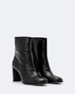 Low pull on heeled boot