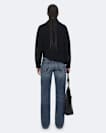 Asymmetric funnel-neck wool jumper