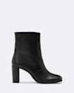 Low pull on heeled boot