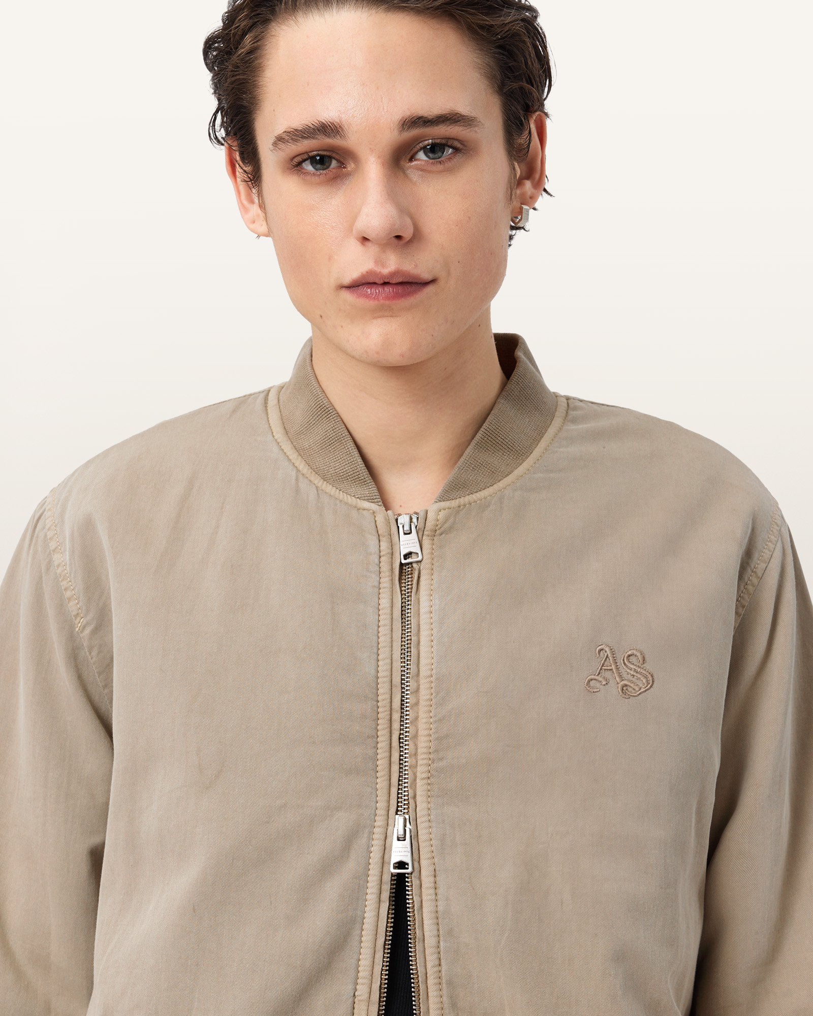 DUAL ZIP CLOSURE