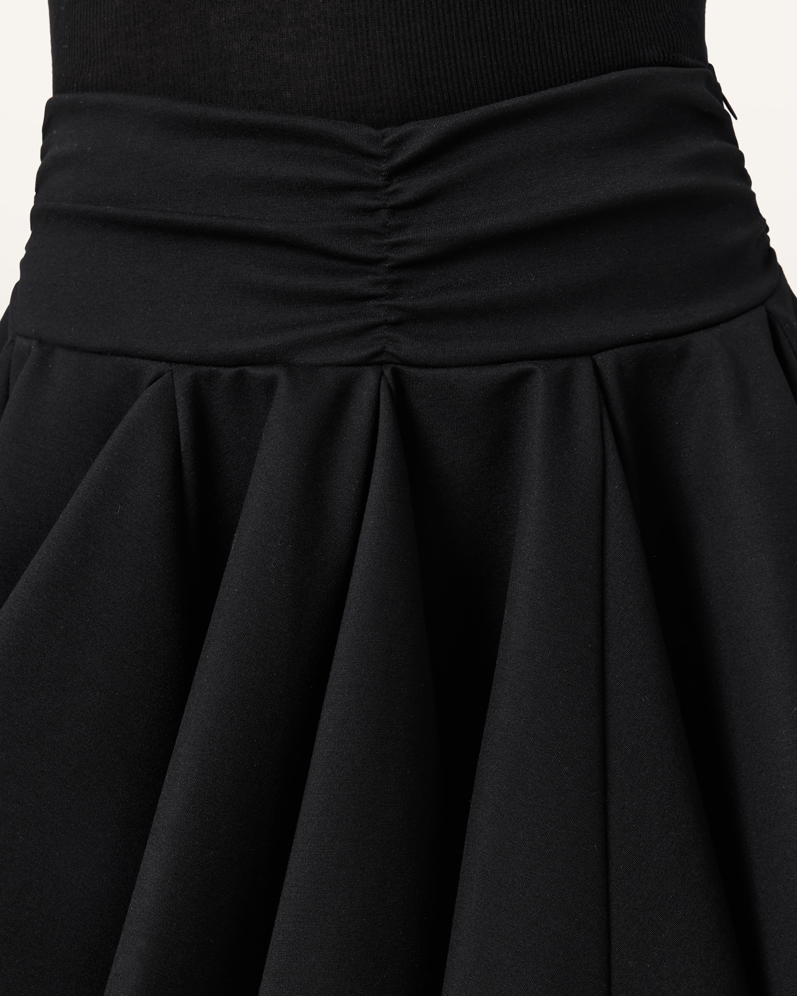 ELASTICATED WAISTBAND