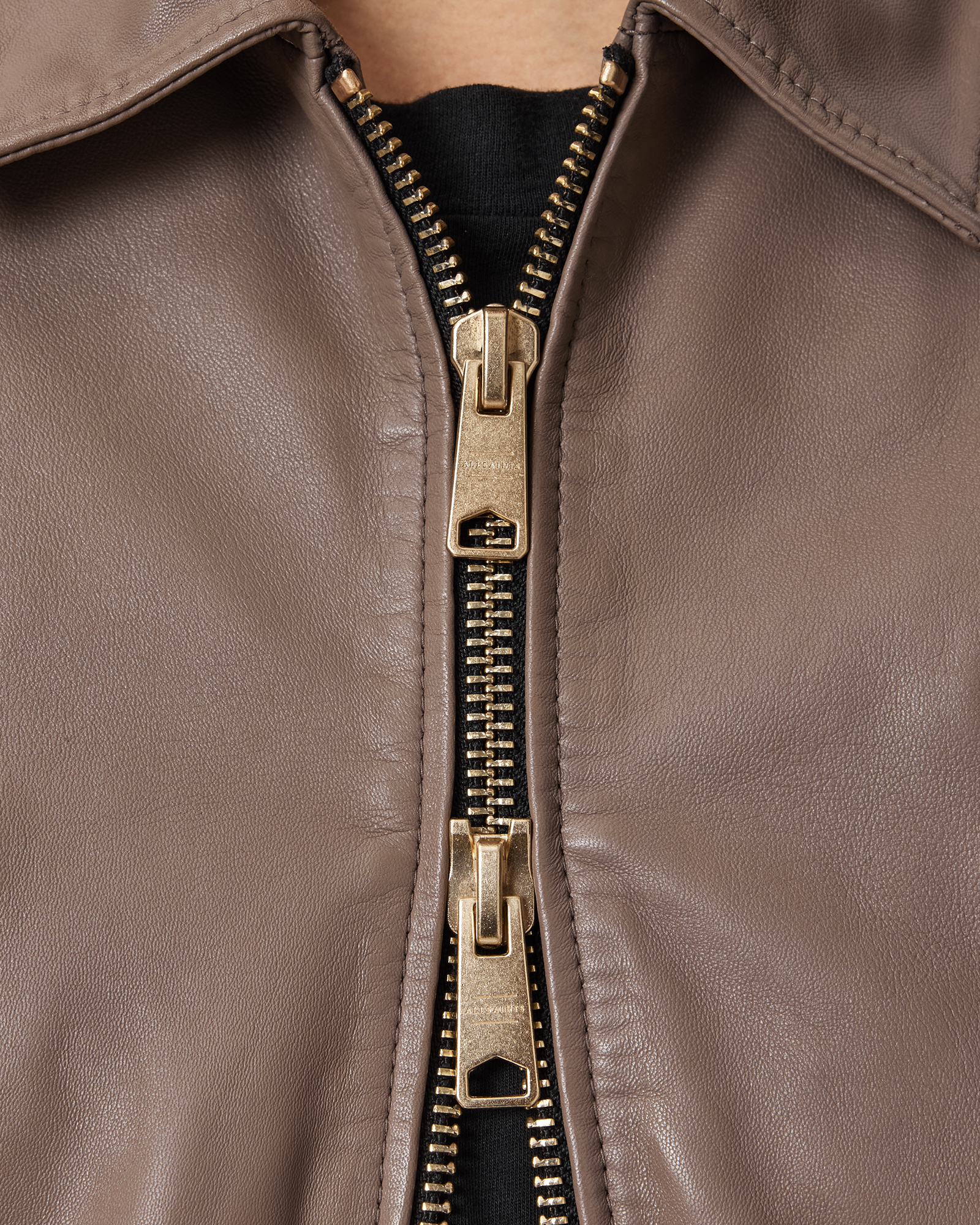 DUAL ZIP CLOSURE