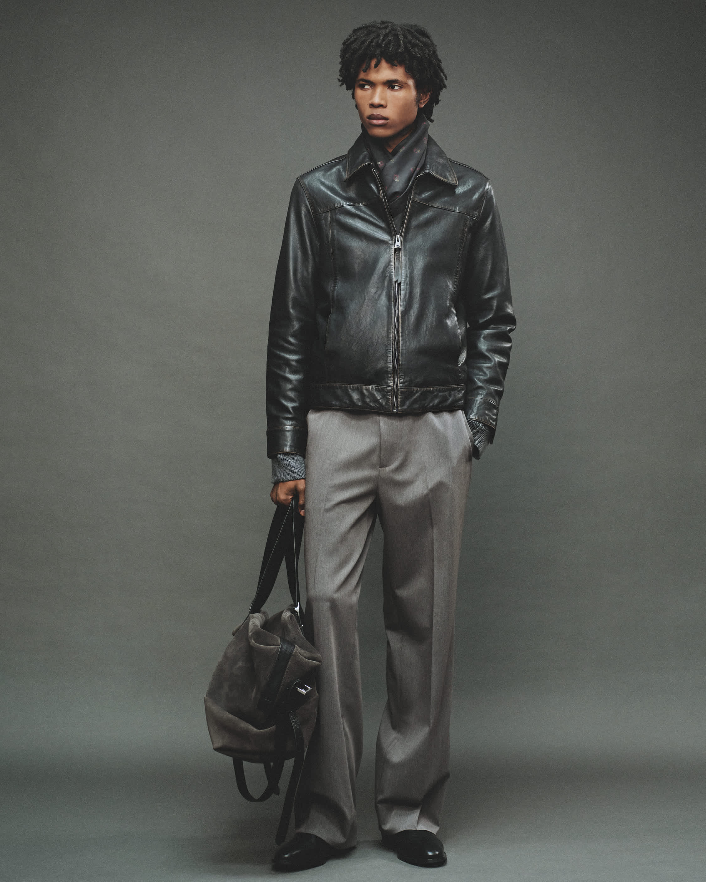 Man wearing a black leather jacket